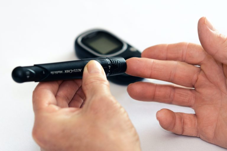 person-holding-black-tube